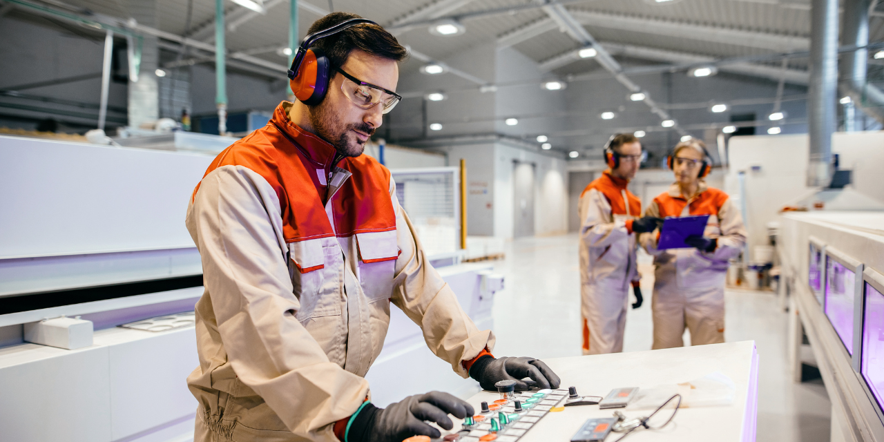 Man standing on a control panel