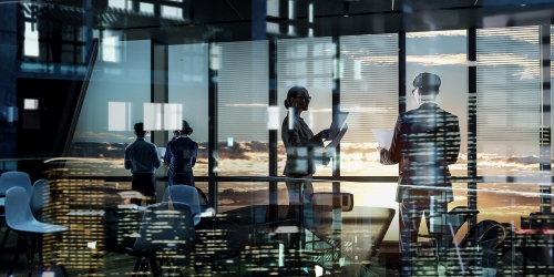 Image of corporate professionals having a discussion 