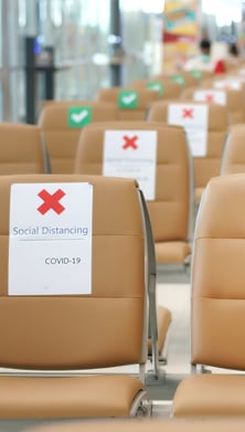 Image of social distancing at an airport 