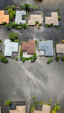 image of houses submerged in a flood 
