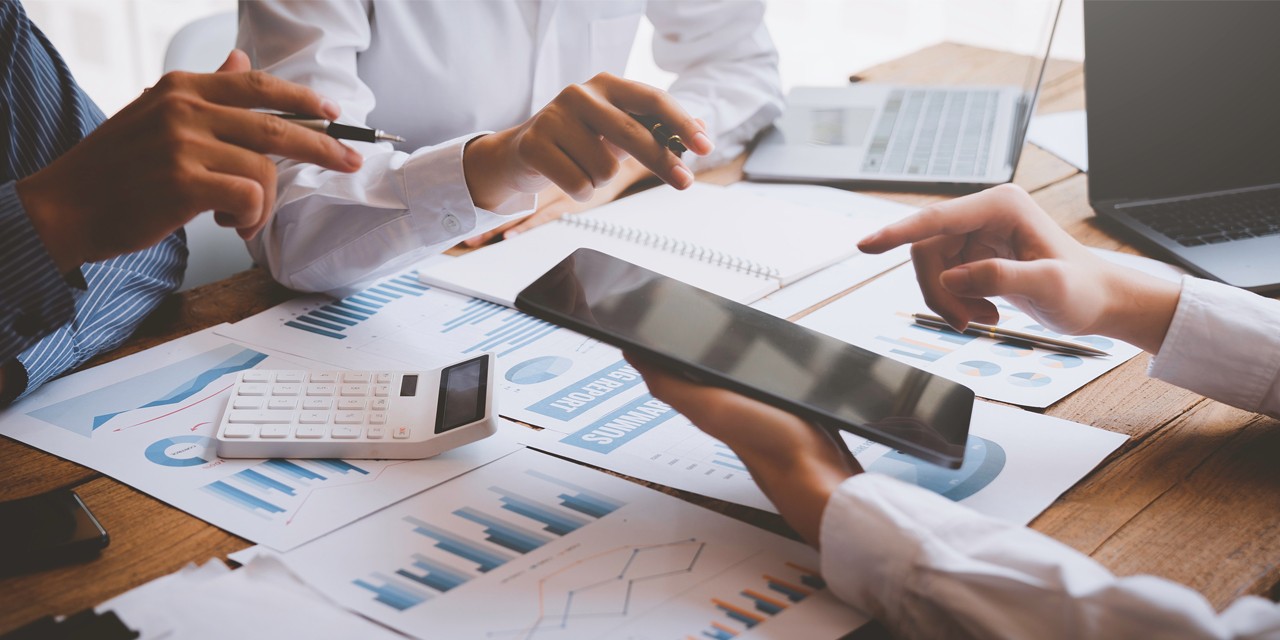 Image of people making calculations