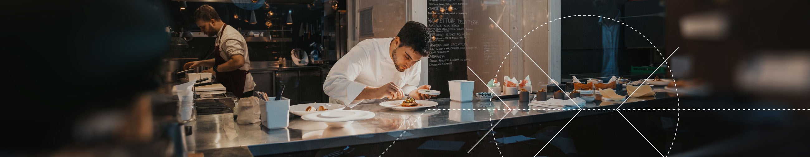  A fine dining chef is passionate about preparing a plate with attention to detail.