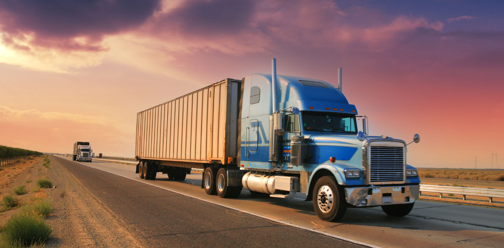 Big transport truck on a highway, sunset atmosphere